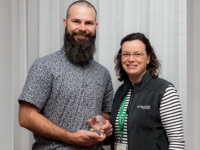 photo of Evan Sepa, Town of Orangeville, receiving the URISA award